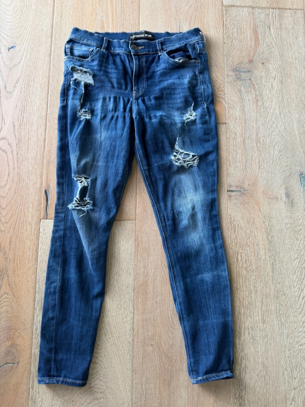 Express Women’s Skinny Jeans in Dark Blue Distressed Wash